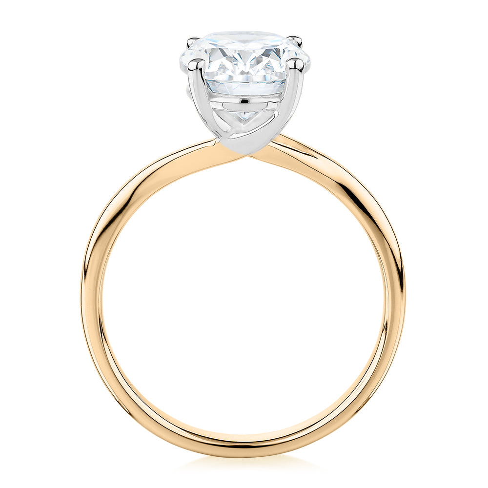 Oval solitaire engagement ring with 2.54 carat* diamond simulant in 14 carat yellow and white gold