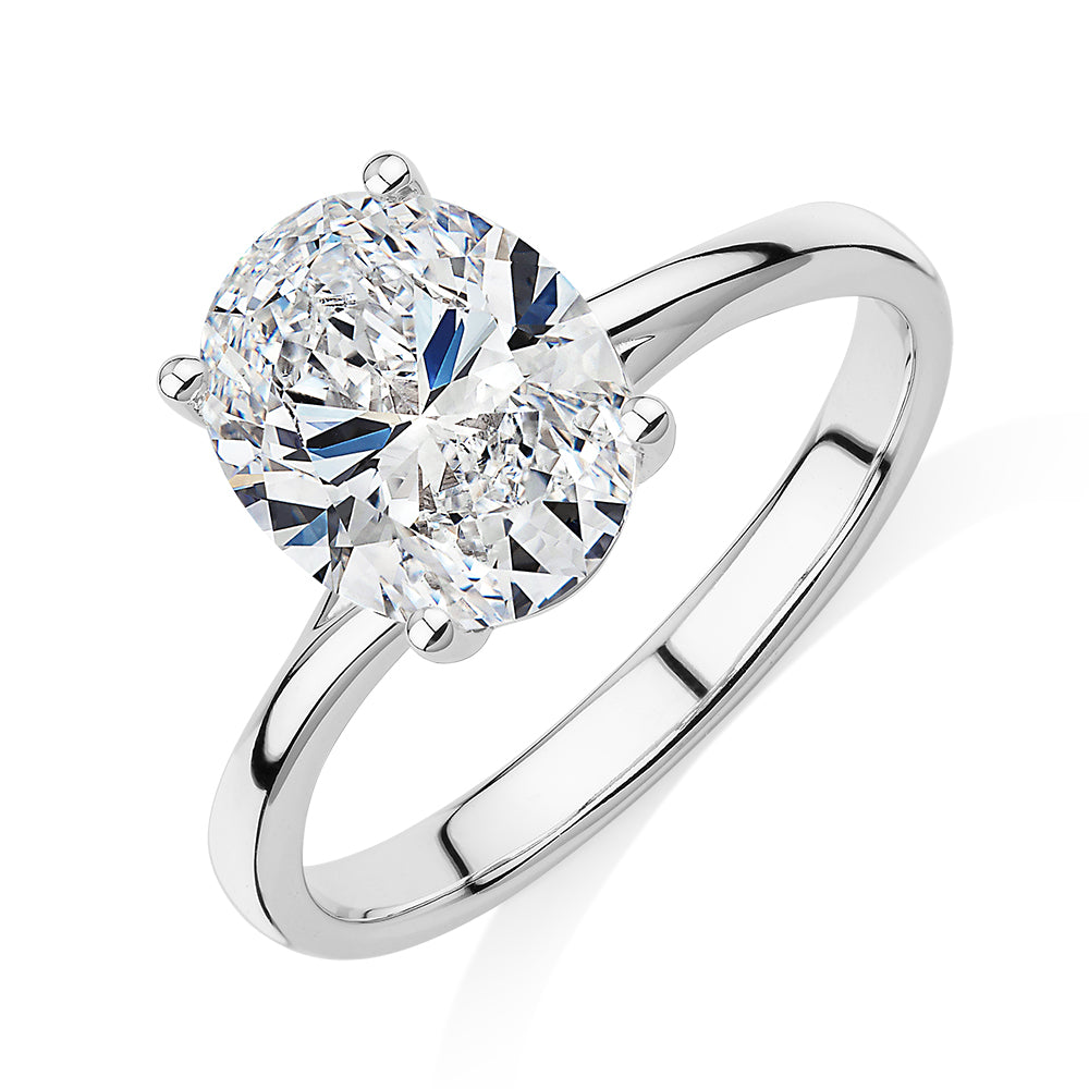 Oval solitaire engagement ring with 2.54 carat* diamond simulant in 14 carat white gold