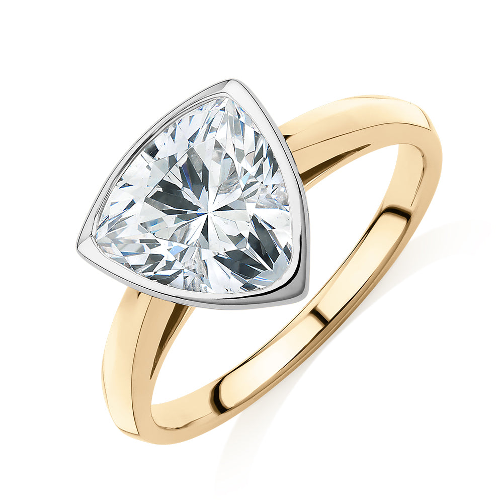 Trilliant solitaire engagement ring with 2.15 carat* diamond simulant in 14 carat yellow and white gold