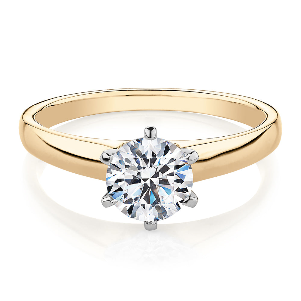 Round Brilliant solitaire engagement ring with 1 carat* diamond simulant in 14 carat yellow and white gold