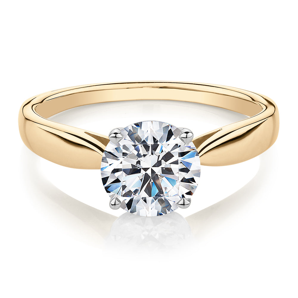 Round Brilliant solitaire engagement ring with carat* diamond simulant  in 14 carat yellow and white gold