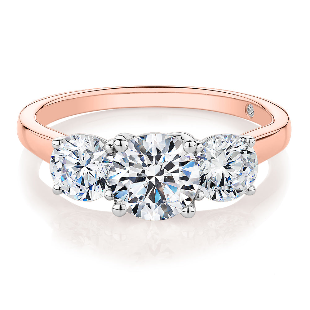 Signature Simulant Diamond 2.00 carat* TW round brilliant cut three stone engagement ring in 10 carat rose and white gold