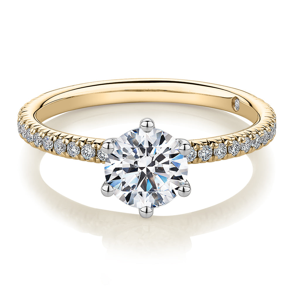 Signature Simulant Diamond 1.19 carat* TW round brilliant shouldered engagement ring in 14 carat yellow and white gold