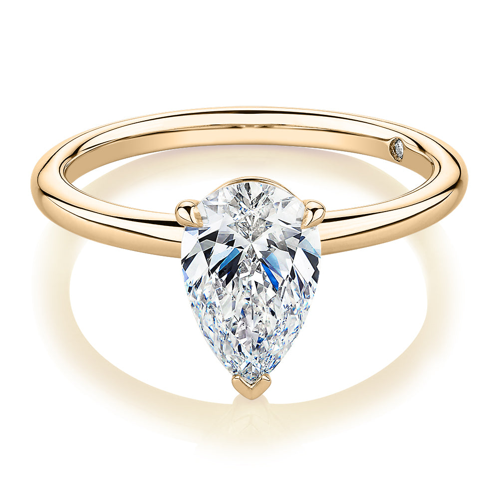 Signature Simulant Diamond 1.50 carat* pear solitaire engagement ring in 14 carat yellow gold