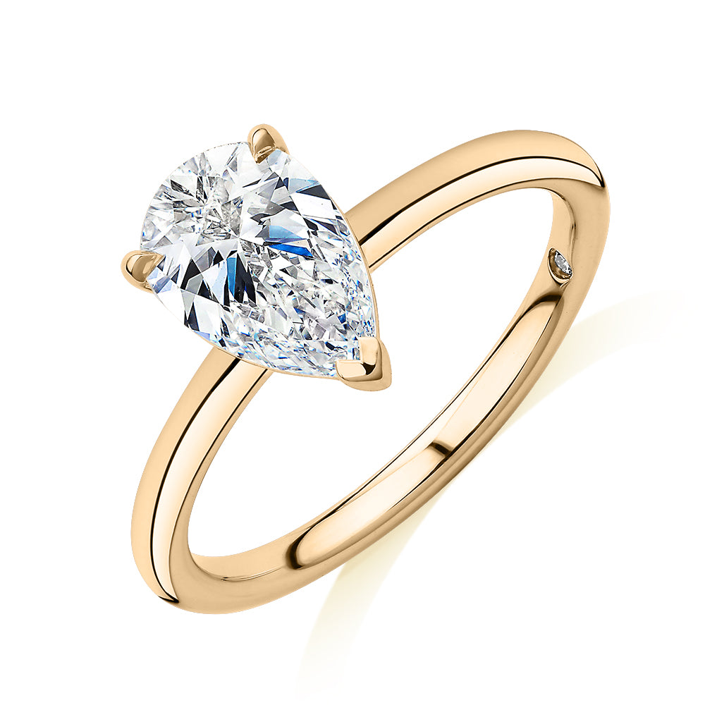 Signature Simulant Diamond 1.50 carat* pear solitaire engagement ring in 14 carat yellow gold