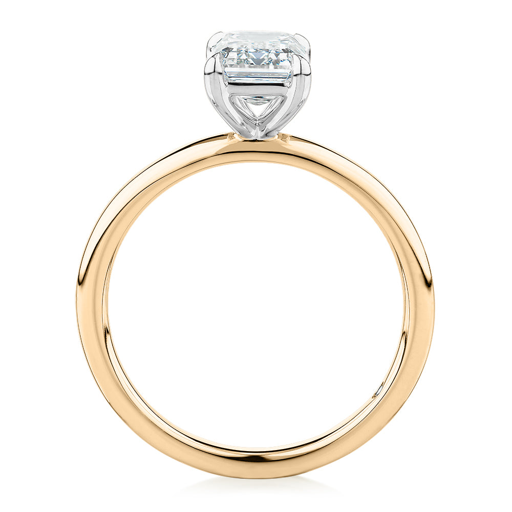 Signature Simulant Diamond 1.50 carat* emerald cut solitaire engagement ring in 14 carat yellow and white gold