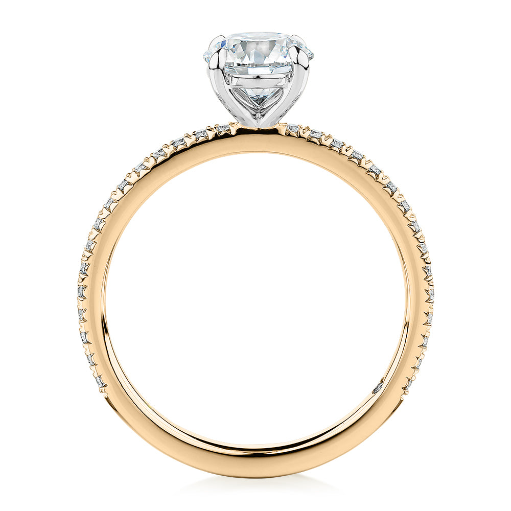 Signature Simulant Diamond 1.24 carat* TW round brilliant shouldered engagement ring in 14 carat yellow and white gold