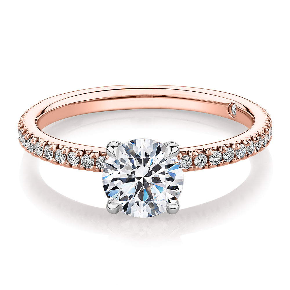 Signature Simulant Diamond 1.24 carat* TW round brilliant shouldered engagement ring in 14 carat rose and white gold