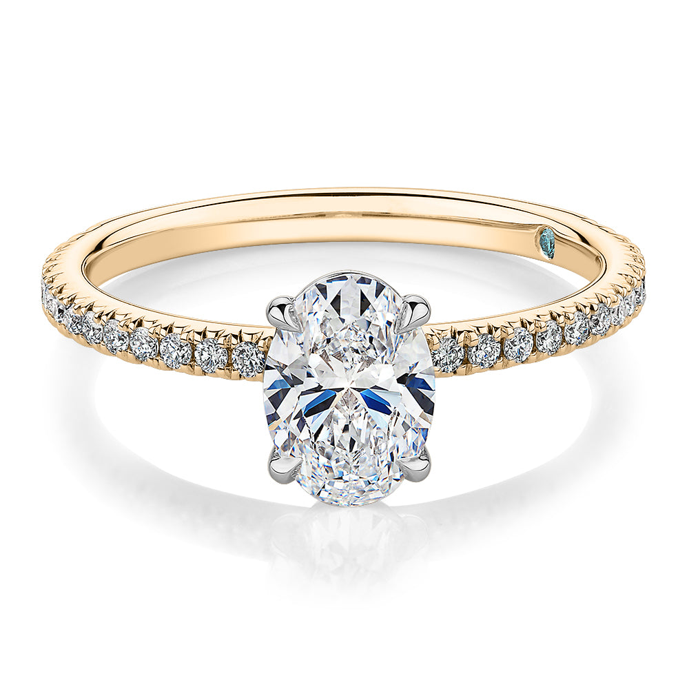 Premium Certified Lab-Grown Diamond, 1.24 carat TW oval and round brilliant shouldered engagement ring in 14 carat yellow and white gold