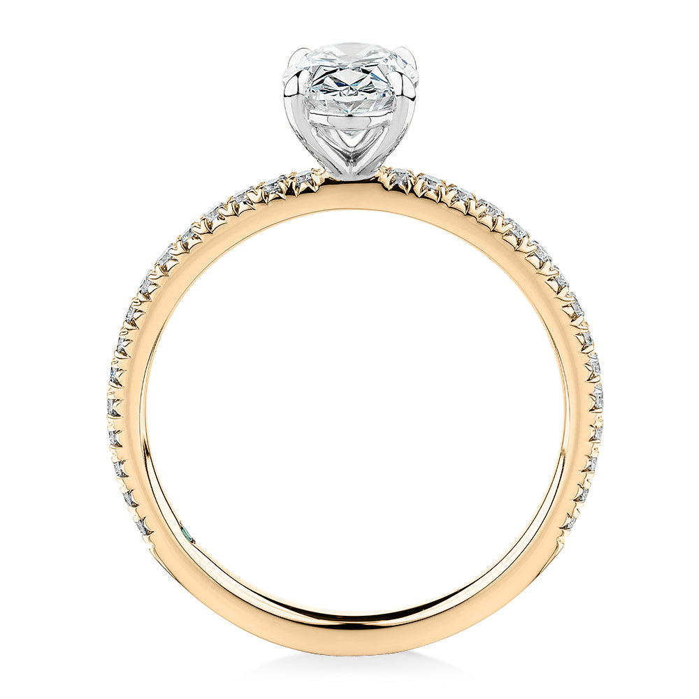 Premium Certified Laboratory Created Diamond, 1.24 carat TW oval and round brilliant shouldered engagement ring in 18 carat yellow and white gold