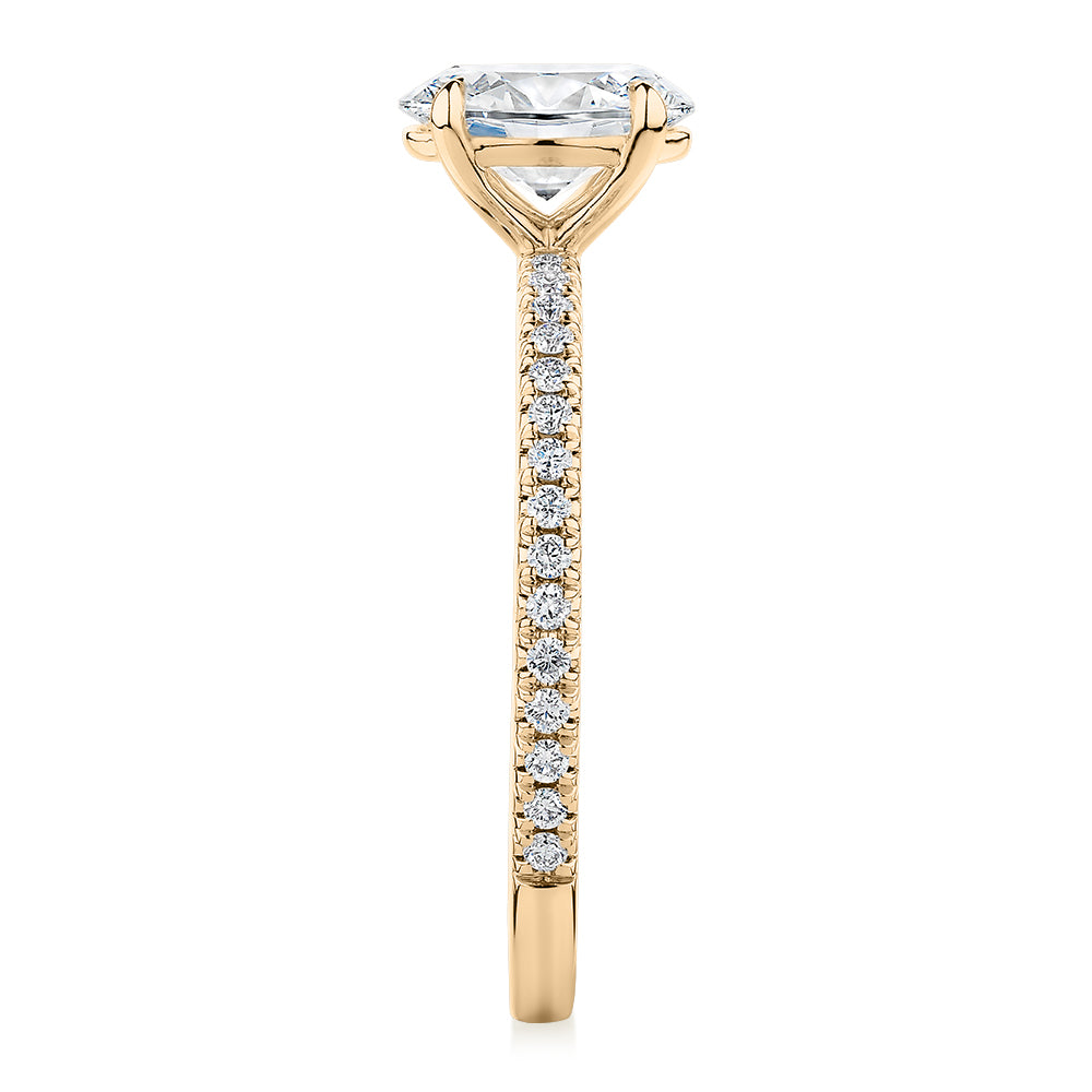 Signature Simulant Diamond 1.24 carat* TW oval and round brilliant shouldered engagement ring in 14 carat yellow gold