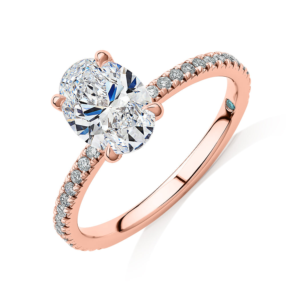 Premium Certified Laboratory Created Diamond, 1.74 carat TW oval and round brilliant shouldered engagement ring in 14 carat rose gold