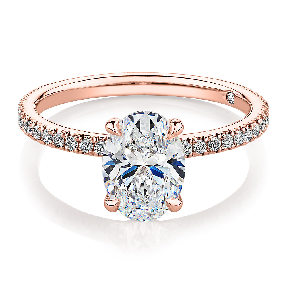 Signature Simulant Diamond 1.74 carat* TW oval and round brilliant shouldered engagement ring in 14 carat rose gold