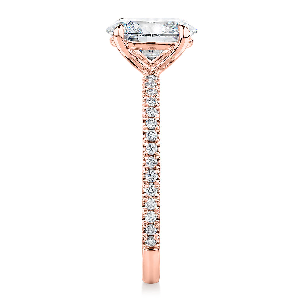 Signature Simulant Diamond 1.74 carat* TW oval and round brilliant shouldered engagement ring in 14 carat rose gold