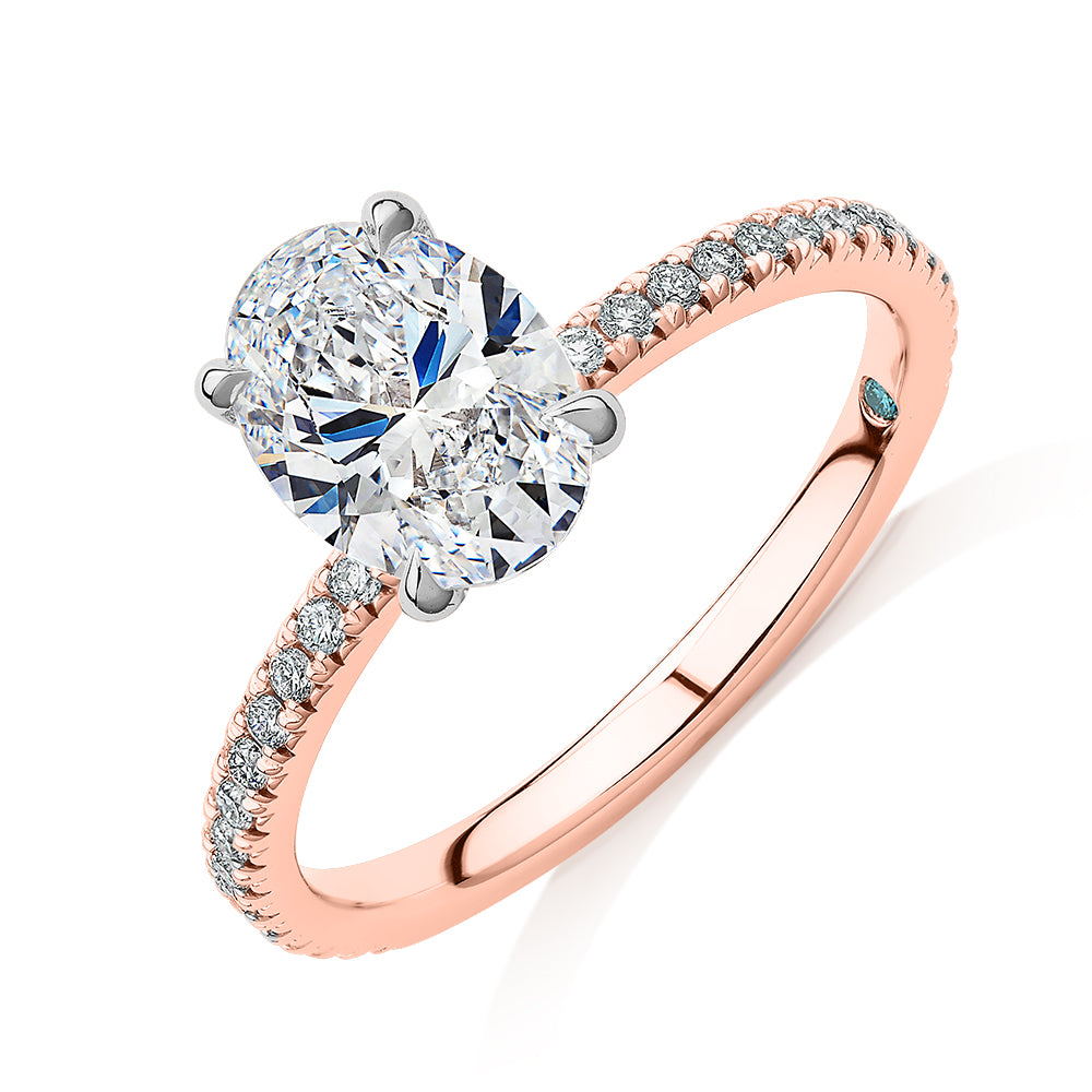 Premium Certified Laboratory Created Diamond, 1.74 carat TW oval and round brilliant shouldered engagement ring in 18 carat rose and white gold