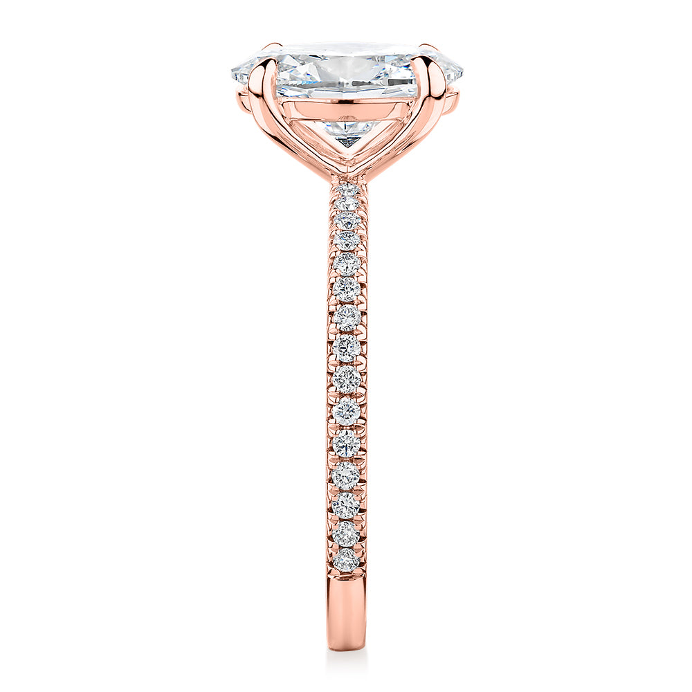 Signature Simulant Diamond 2.24 carat* TW oval and round brilliant shouldered engagement ring in 14 carat rose gold