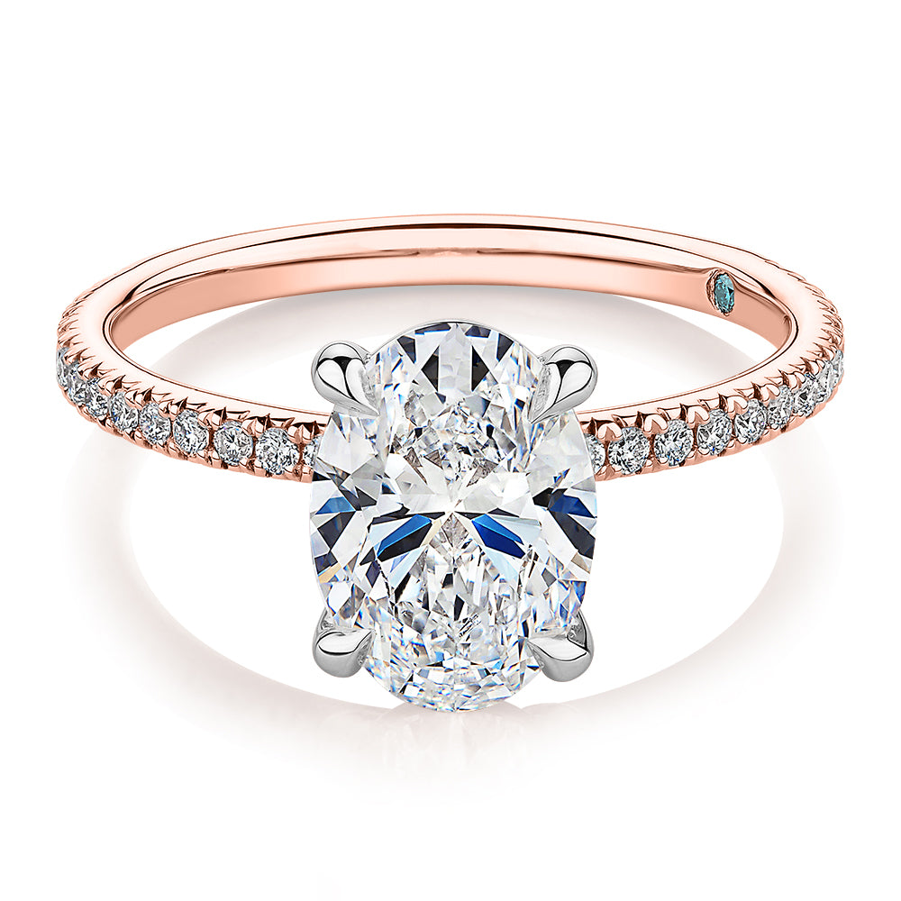 Premium Certified Lab-Grown Diamond, 2.24 carat TW oval and round brilliant shouldered engagement ring in 14 carat rose and white gold
