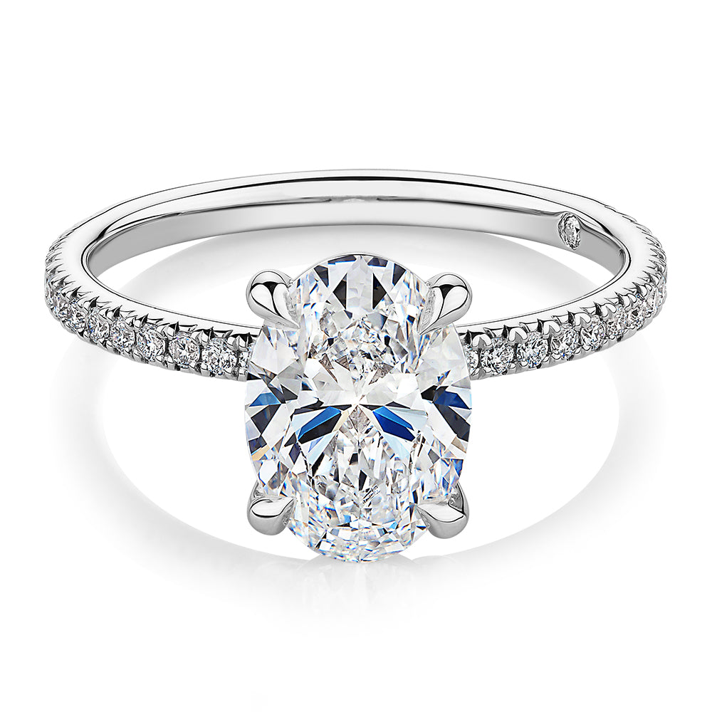 Signature Simulant Diamond 2.19 carat* TW oval cut shouldered engagement ring in 14 carat white gold