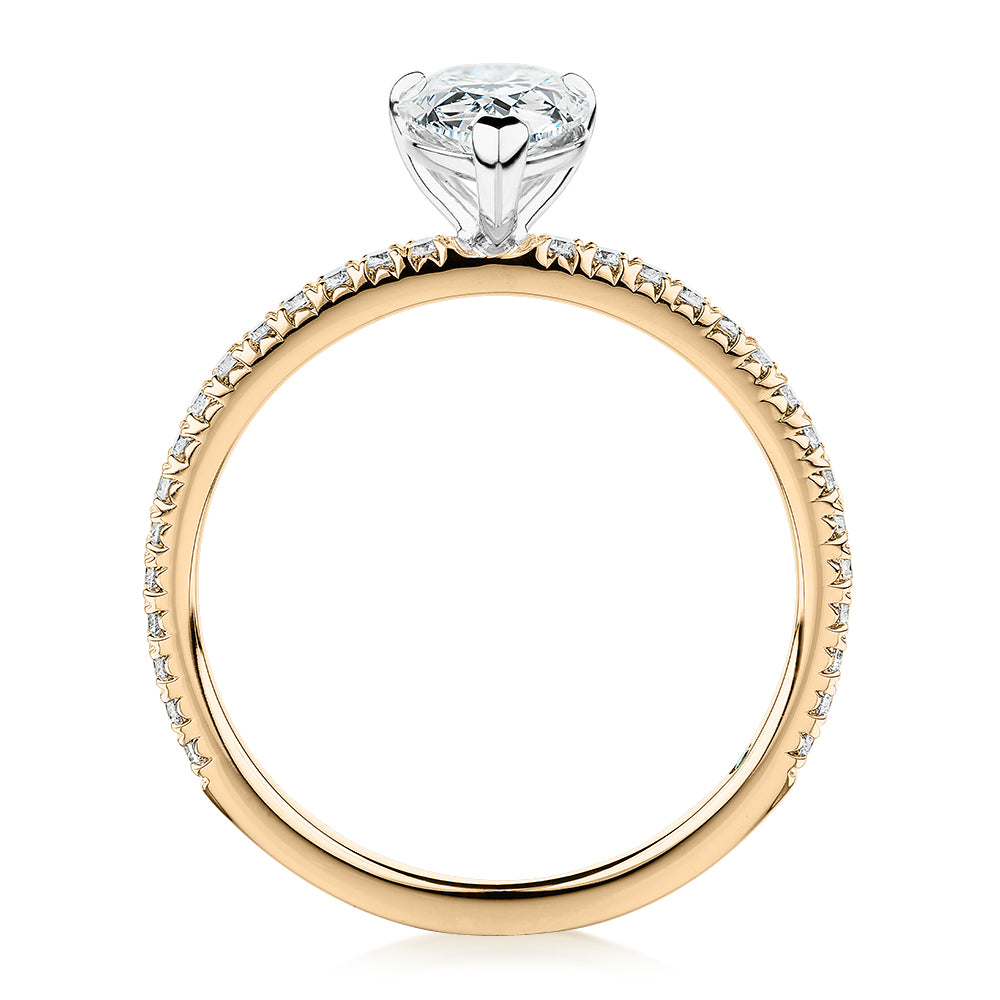 Premium Certified Laboratory Created Diamond, 1.24 carat TW pear and round brilliant shouldered engagement ring in 18 carat yellow and white gold