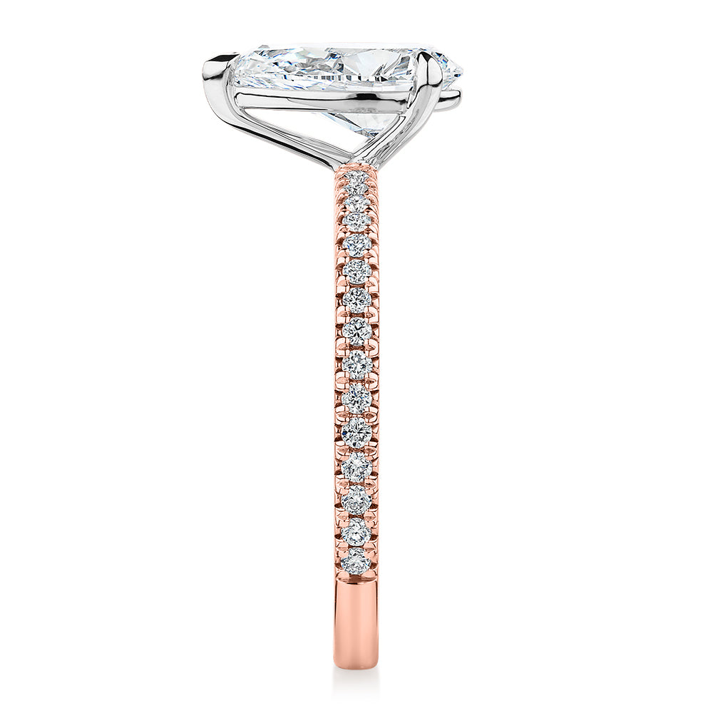 Signature Simulant Diamond 1.74 carat* TW pear and round brilliant shouldered engagement ring in 14 carat rose and white gold