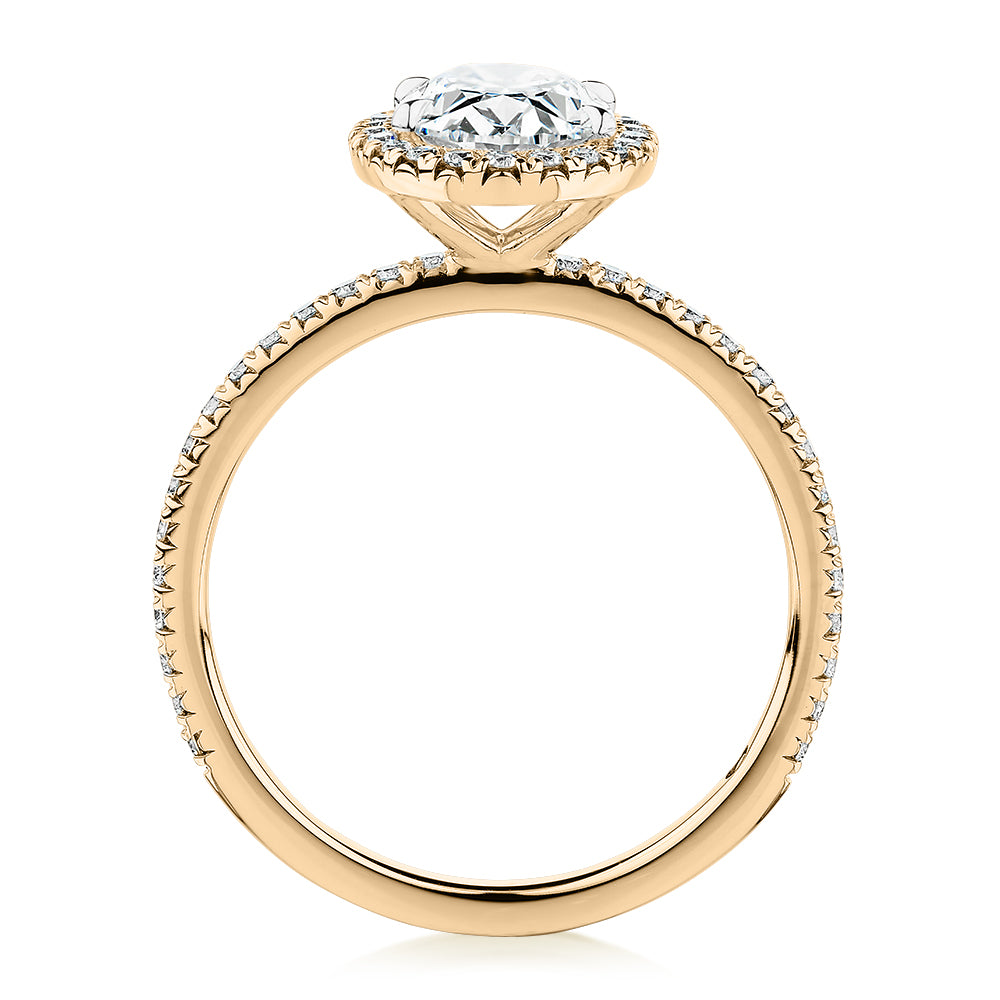 Signature Simulant Diamond 1.89 carat* TW oval and round brilliant halo engagement ring in 14 carat yellow and white gold