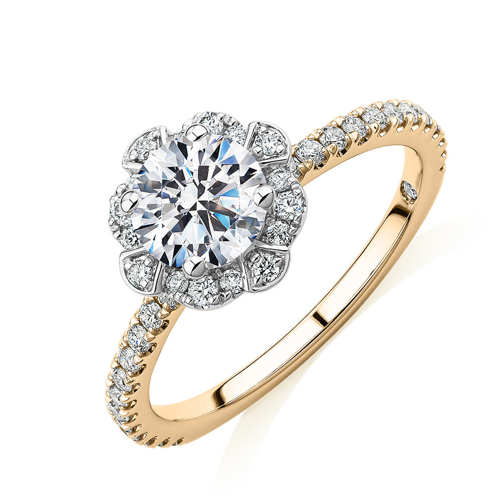 Signature Simulant Diamond 1.40 carat* TW round brilliant halo engagement ring in 14 carat yellow and white gold