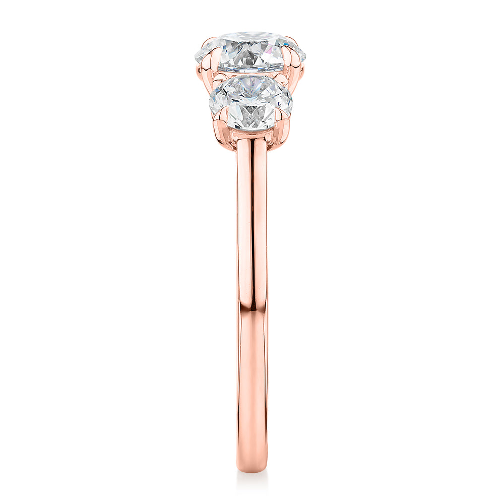 Signature Simulant Diamond 1.86 carat* TW round brilliant three stone ring in 14 carat rose gold
