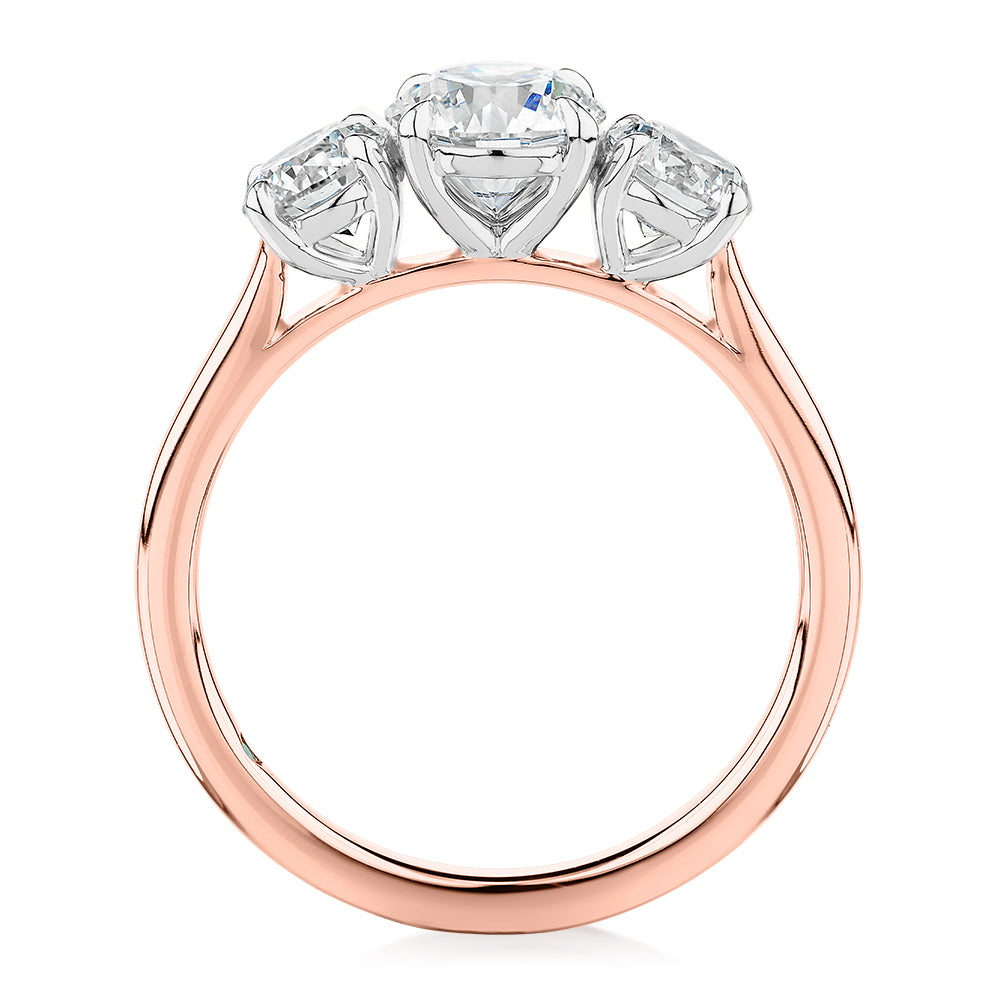 Signature Simulant Diamond 1.86 carat* TW round brilliant three stone ring in 14 carat rose and white gold