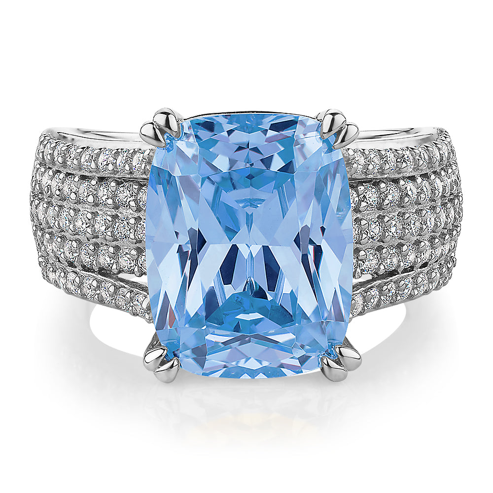 Dress ring with blue topaz simulant and carats* of diamond simulants in  sterling silver