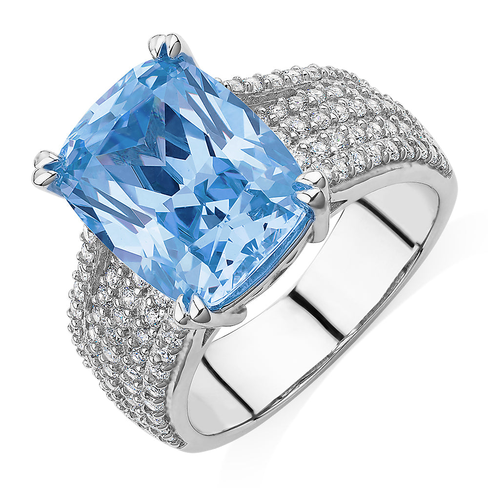 Dress ring with blue topaz simulant in sterling silver