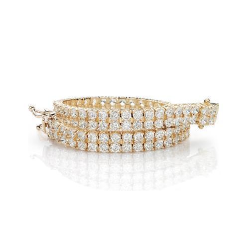 Round Brilliant tennis bracelet with 12.54 carats* of diamond simulants in 10 carat yellow gold