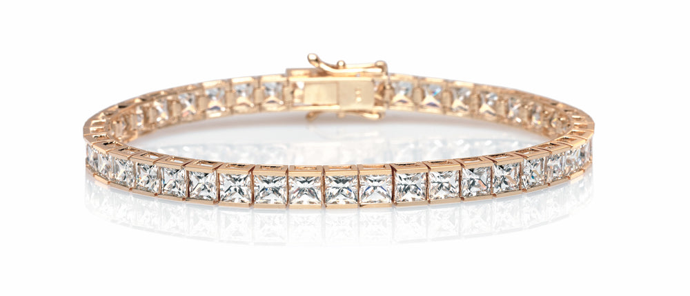Princess Cut tennis bracelet with 18.72 carats* of diamond simulants in 10 carat yellow gold
