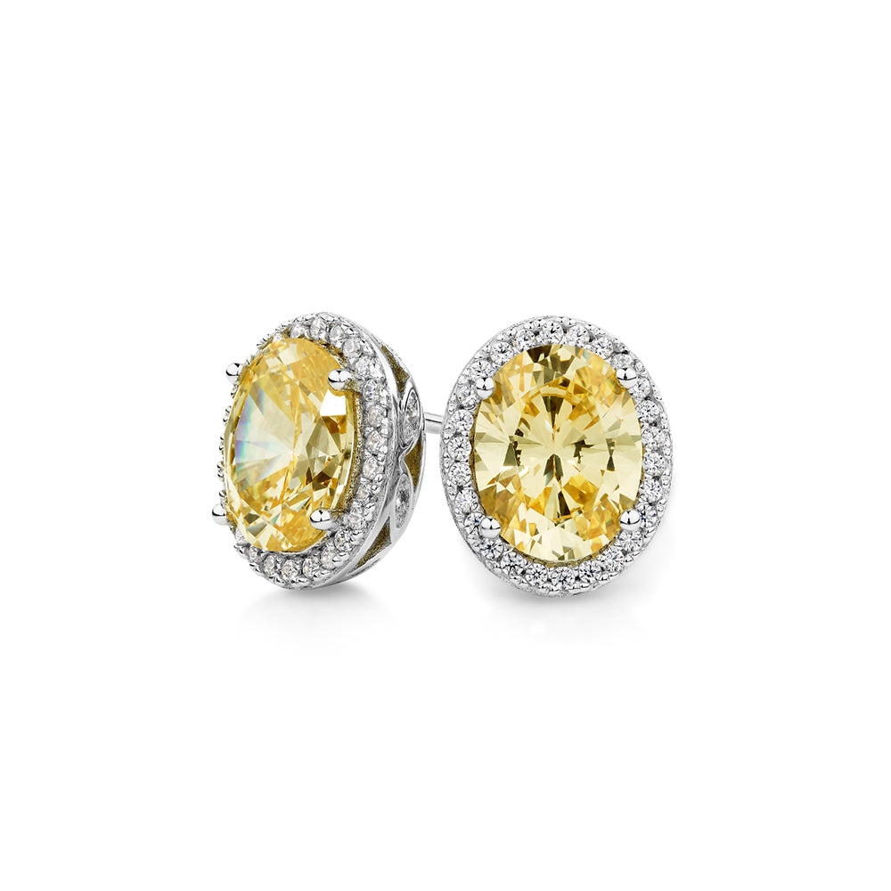 Oval and Round Brilliant halo stud earrings with 4.06 carats* of diamond simulants in sterling silver