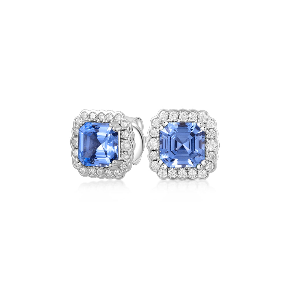 Asscher and Round Brilliant halo stud earrings with blue topaz simulants and 0.42 carats* of diamond simulants in sterling silver
