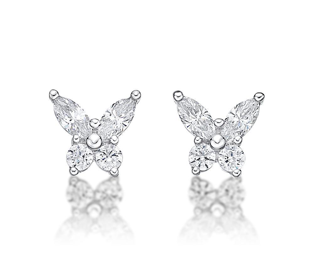 Round Brilliant and Marquise stud earrings with 0.8 carats* of diamond simulants in 10 carat white gold