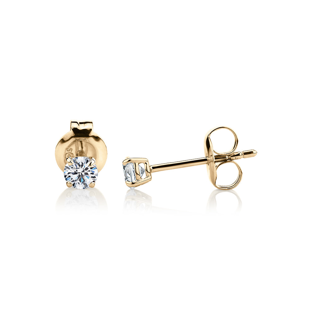 Round Brilliant stud earrings with 0.25 carats* of diamond simulants in 10 carat yellow gold