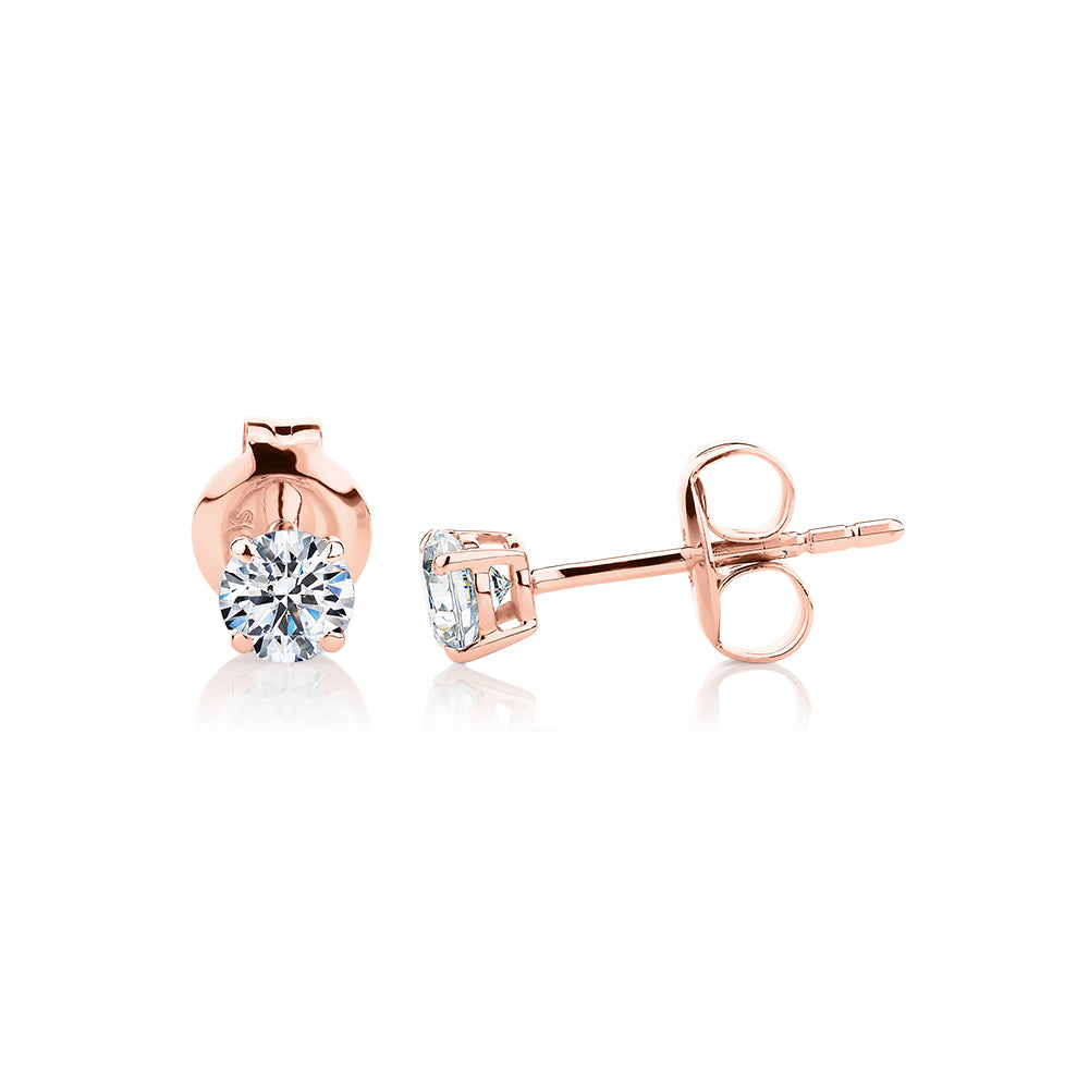 Round Brilliant stud earrings with 0.5 carats* of diamond simulants in 10 carat rose gold