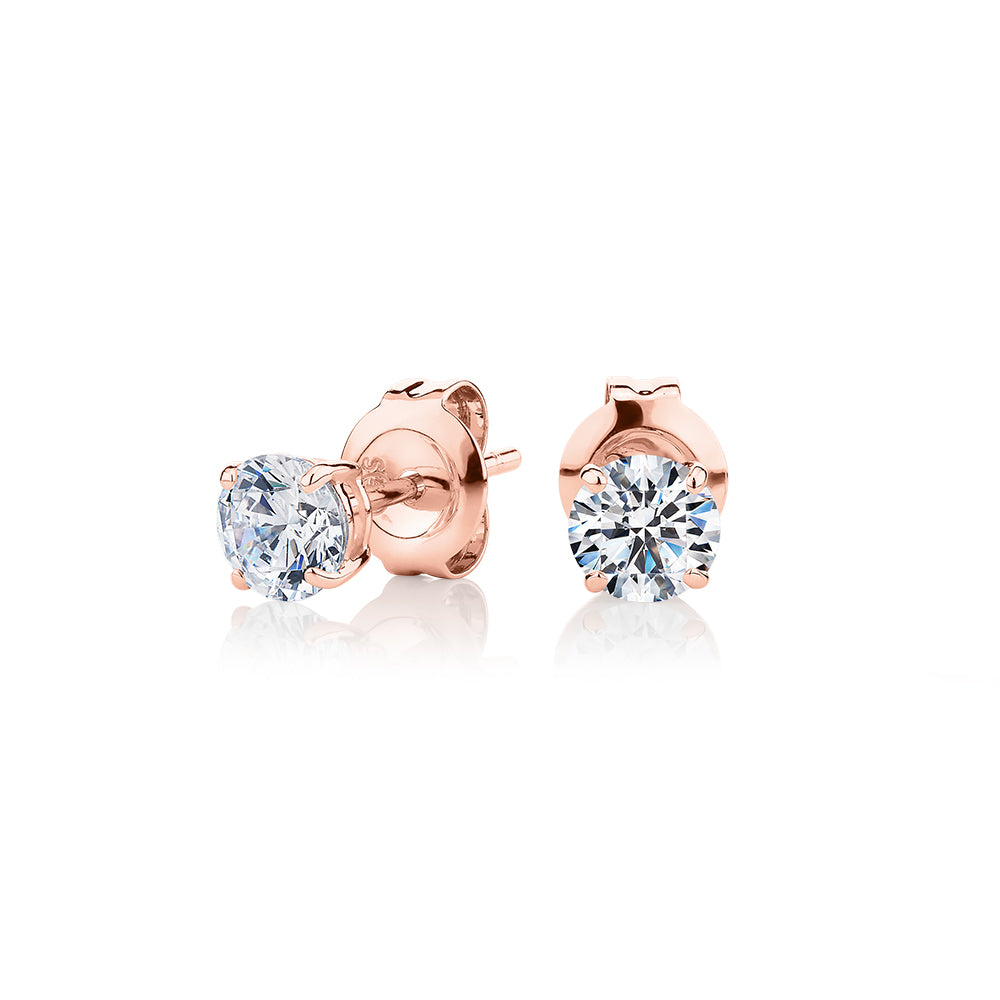 Round Brilliant stud earrings with 0.75 carats* of diamond simulants in 10 carat rose gold