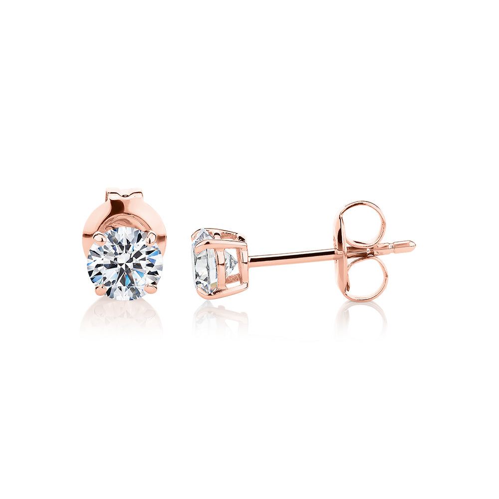 Round Brilliant stud earrings with 0.75 carats* of diamond simulants in 10 carat rose gold