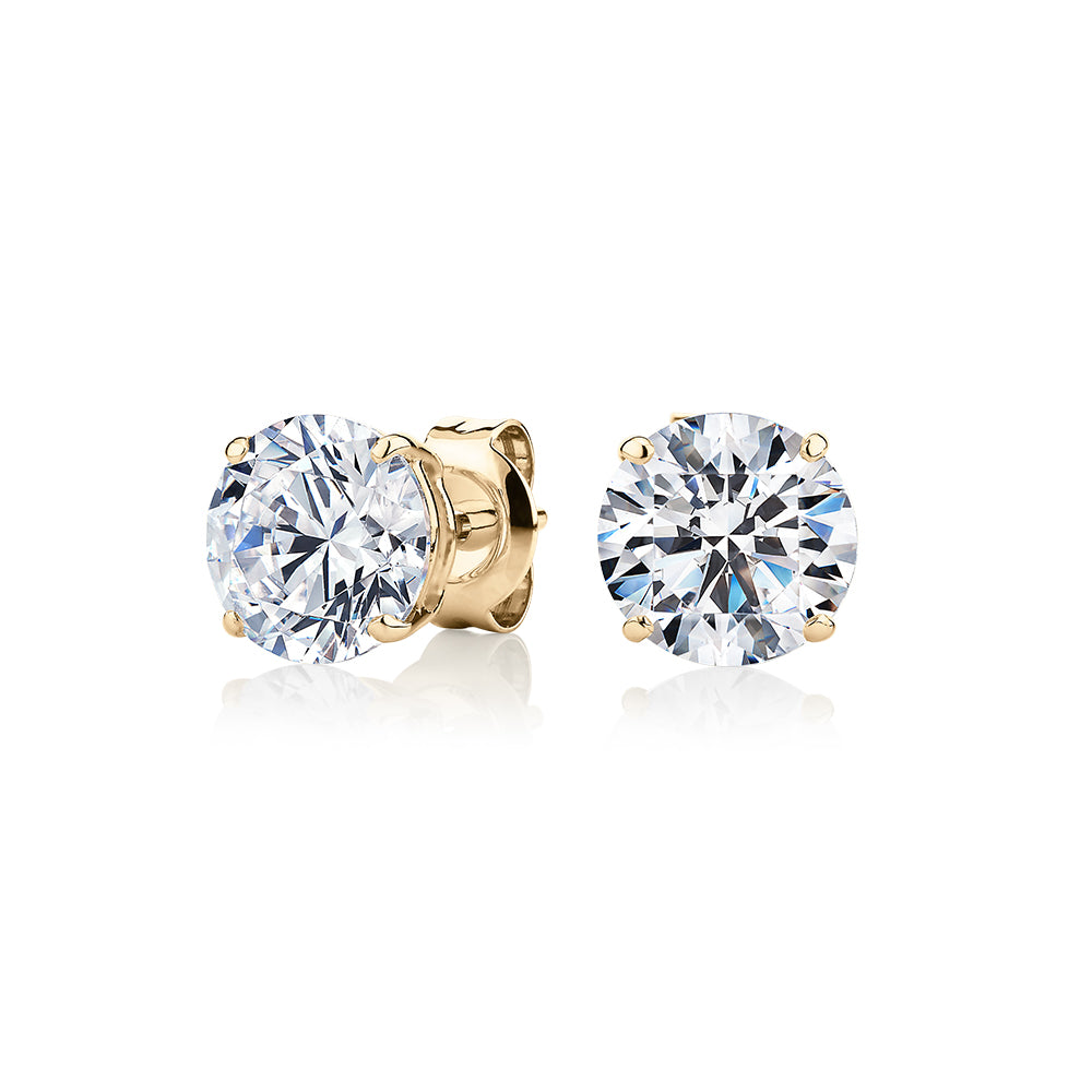 Round Brilliant stud earrings with 3 carats* of diamond simulants in 10 carat yellow gold