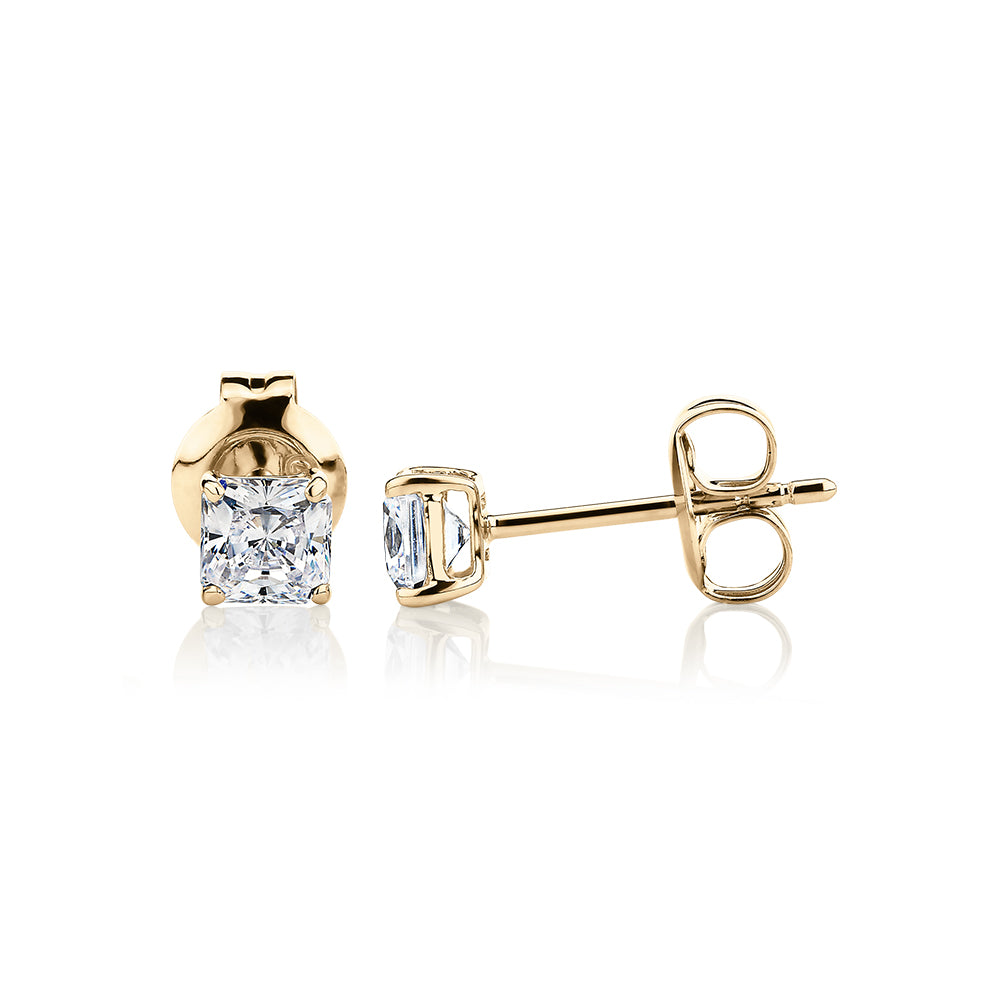 Princess Cut stud earrings with 0.5 carats* of diamond simulants in 10 carat yellow gold