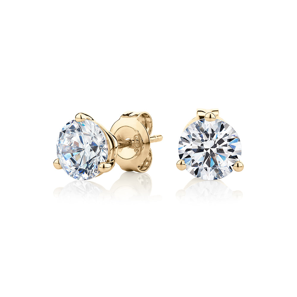 Round Brilliant stud earrings with 2.06 carats* of diamond simulants in 10 carat yellow gold
