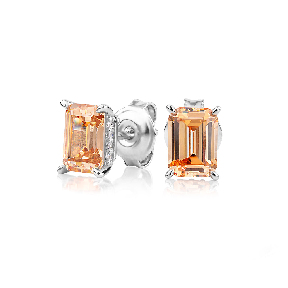 Emerald Cut and Round Brilliant stud earrings with 2.24 carats* of diamond simulants in sterling silver