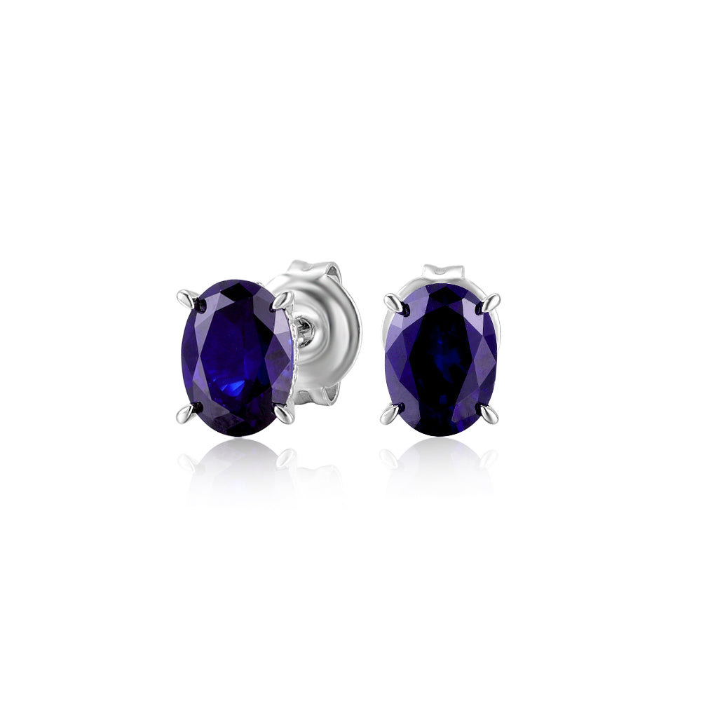 Oval stud earrings with dark blue sapphire simulants in sterling silver