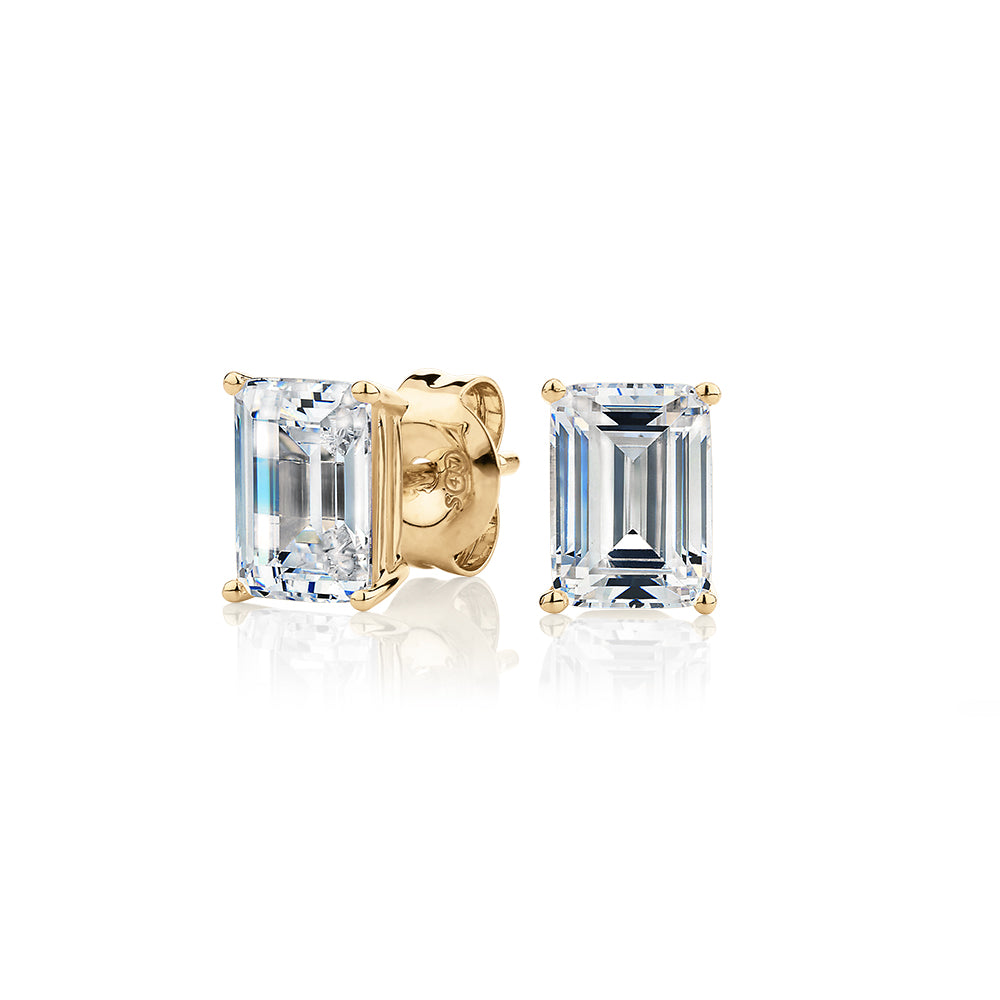 Emerald Cut stud earrings with 2 carats* of diamond simulants in 10 carat yellow gold