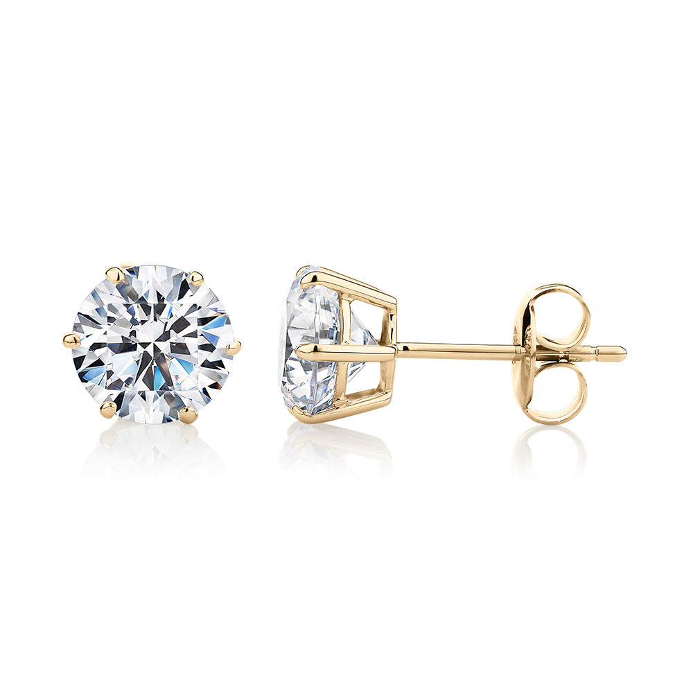 Round Brilliant stud earrings with 3 carats* of diamond simulants in 10 carat yellow gold