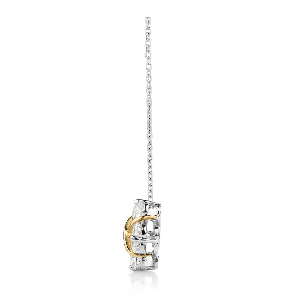 Fancy pendant with 1.76 carats* of diamond simulants in 10 carat yellow gold and sterling silver