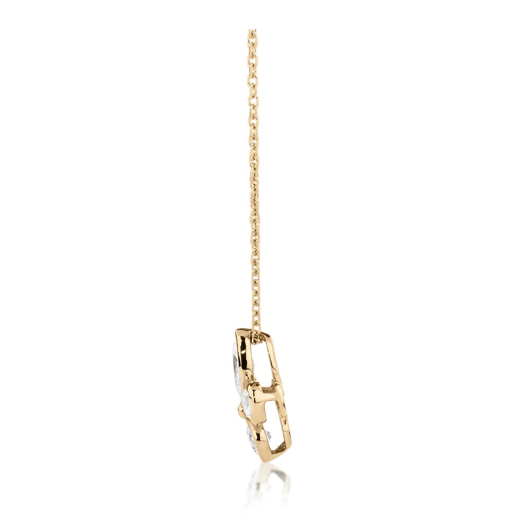 Fancy pendant with 0.58 carats* of diamond simulants in 10 carat yellow gold