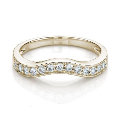Curved wedding or eternity band with 0.3 carats* of diamond simulants in 14 carat yellow gold