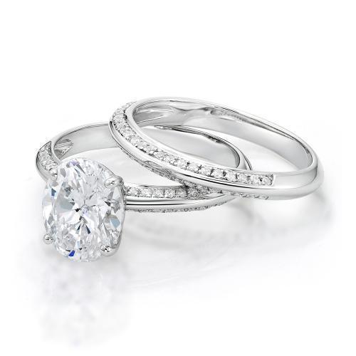 Oval Cut Knife Edge Engagement Ring and Band Set in White Gold